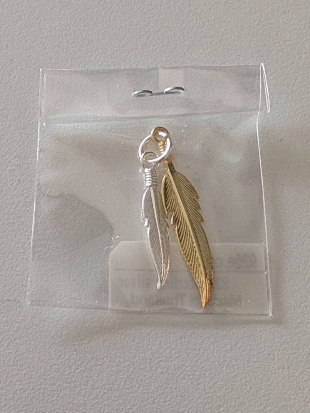 92.5 Sterling silver feather pendant, half gold plated